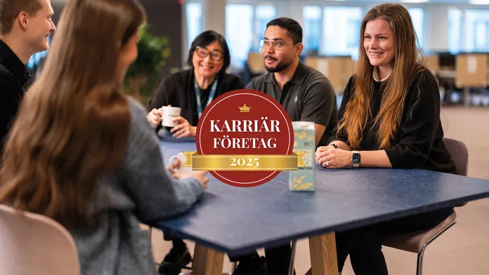 Medarbetare på Axfood runt ett bord