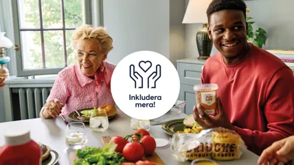 En man och kvinna äter mat med varor från Eldorado och Garant